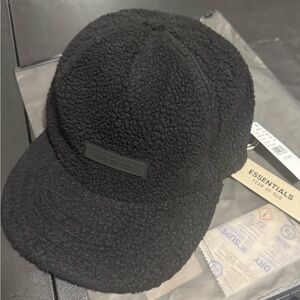 Fear of God ESSENTIALS Jet Black Sherpa Fleece Baseball Hat.